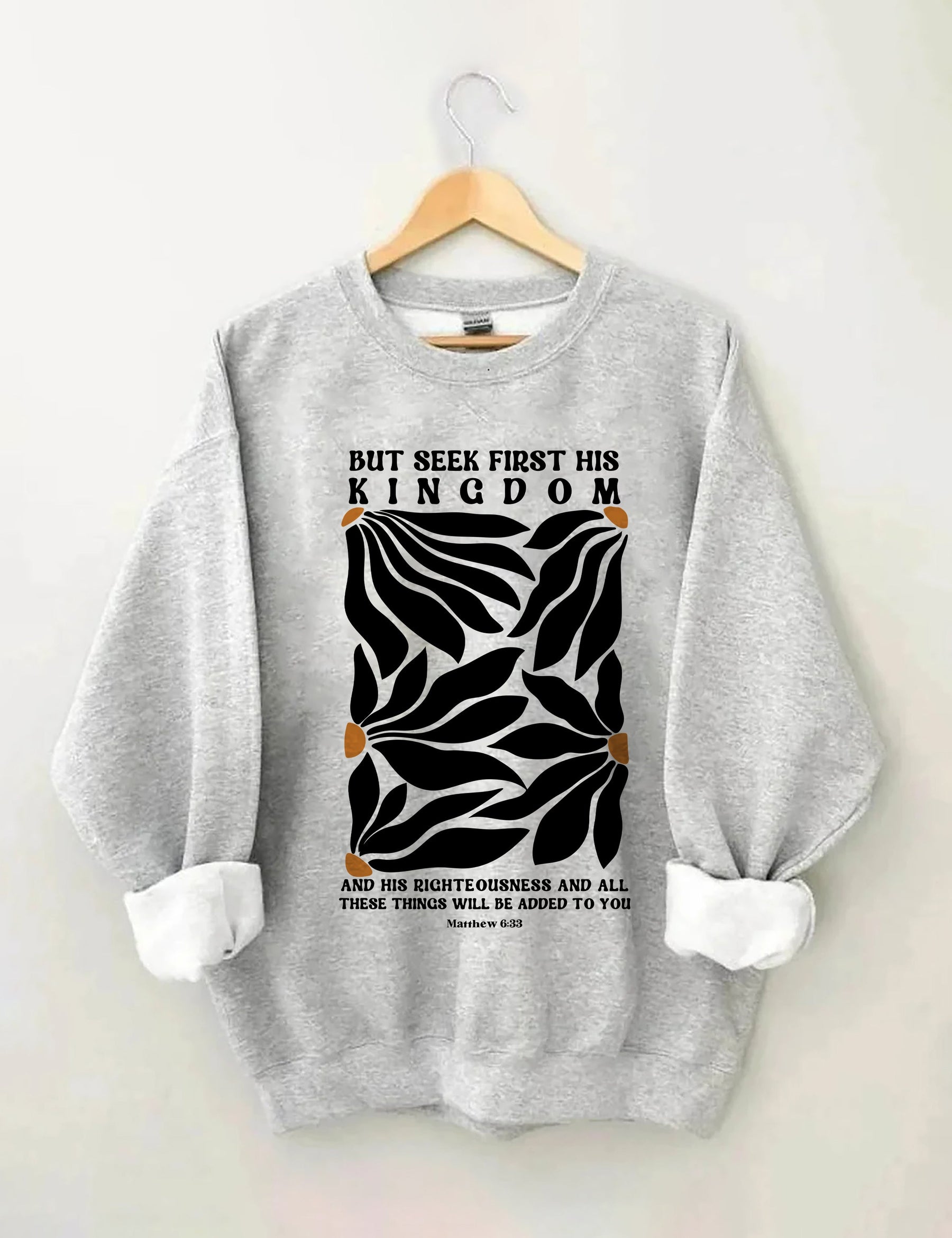 Aber suchen Sie zuerst sein Königreich-Blumen-Sweatshirt