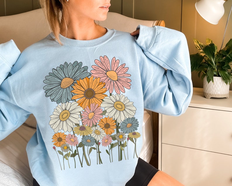 Sweat-shirt à fleurs de marguerites rétro