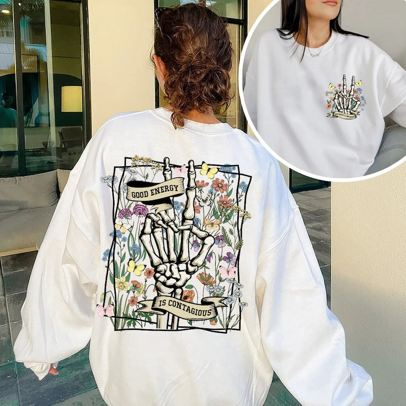 La bonne énergie est contagieuse crâne squelette fleur sauvage Sweatshirt