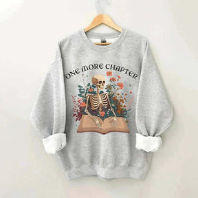 One More Chapter Skeleton Reader Sweatshirt