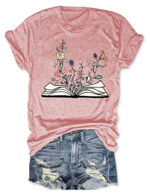 T-shirt Fleurs poussant à partir d’un livre