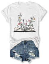 T-shirt Fleurs poussant à partir d’un livre