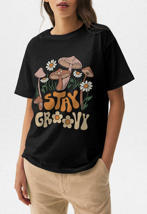 Bleiben Sie grooviges Hippie-Blumen-T-Shirt